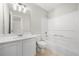 Bathroom featuring a tub, shower, vanity, and toilet at 4645 Valais Ct # 135, Alpharetta, GA 30022