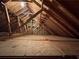 Spacious attic featuring exposed wooden beams and ample storage potential at 4811 West Lake Se Dr, Conyers, GA 30094