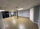 Finished basement with recessed lights, dark support beam, and neutral floors at 4811 West Lake Se Dr, Conyers, GA 30094