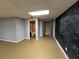 Finished basement featuring a bathroom and closet area with neutral paint at 4811 West Lake Se Dr, Conyers, GA 30094