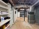 Unfinished basement with utility connections, shelving, and storage area at 4811 West Lake Se Dr, Conyers, GA 30094