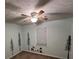 Bedroom with whimsical forest-themed wall decor and plush neutral carpet at 4811 West Lake Se Dr, Conyers, GA 30094