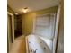 Bathroom featuring a corner tub with jetted water and a stand-up shower at 4811 West Lake Se Dr, Conyers, GA 30094