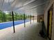 A lake view can be seen from the covered backyard pool and patio space at 4811 West Lake Se Dr, Conyers, GA 30094