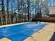 A lake view can be seen from the backyard pool and patio space at 4811 West Lake Se Dr, Conyers, GA 30094