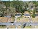 Aerial view showing neighborhood homes with mature trees and well-maintained lawns along a tree-lined street at 2587 Lancaster Dr, Atlanta, GA 30344