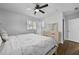Bright bedroom with natural light, hard wood floors, ceiling fan and door to closet at 2587 Lancaster Dr, Atlanta, GA 30344