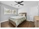 Comfortable bedroom with hardwood floors and a large window for natural light at 2587 Lancaster Dr, Atlanta, GA 30344