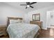 Bedroom featuring a wood dresser and a comfy bed with plenty of sunlight at 2587 Lancaster Dr, Atlanta, GA 30344