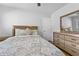 Bedroom featuring a wood dresser and a comfy bed with plenty of sunlight at 2587 Lancaster Dr, Atlanta, GA 30344
