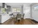Stylish kitchen with white countertops, modern appliances, and an adjacent dining area at 2587 Lancaster Dr, Atlanta, GA 30344