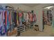 Walk-in closet with dual hanging racks, shelving, and ample storage for clothes and shoes at 3000 Gallery Walk, Snellville, GA 30039