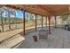 Covered patio offering scenic view of the golf course at 3000 Gallery Walk, Snellville, GA 30039
