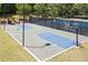 Community basketball court with lighting for evening games at 3211 Blaisdell Rd, Buford, GA 30519