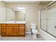 Bathroom featuring a vanity, toilet, tiled floors, and enclosed shower at 3211 Blaisdell Rd, Buford, GA 30519