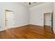 Spacious bedroom featuring hardwood floors and a neutral color scheme, offering versatility for personal decoration at 3211 Blaisdell Rd, Buford, GA 30519