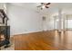 Bright living room with hardwood floors and a fireplace, perfect for Gathering gatherings and cozy evenings at 3211 Blaisdell Rd, Buford, GA 30519