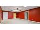 Expansive room showcases carpeted floors, white doors, and neutral trim at 3211 Blaisdell Rd, Buford, GA 30519
