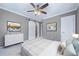 Stylish bedroom with a barn door, soft color palette, and neutral furnishings at , Atlanta, GA 30315