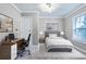 Cozy bedroom with a desk area, updated carpet, and ample natural light at , Atlanta, GA 30315