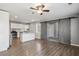 Eat-in kitchen featuring stainless steel appliances, granite counters, and gray barn doors at , Atlanta, GA 30315
