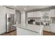 Modern kitchen with stainless appliances, granite countertops and island with seating at , Atlanta, GA 30315