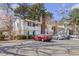 Attractive condo with charming exterior, chimney, well-maintained landscaping, and convenient parking at 1508 Wingate Way, Atlanta, GA 30350