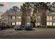 Attractive condo with charming exterior, second story staircase, landscaping, and convenient parking at 1508 Wingate Way, Atlanta, GA 30350