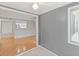 Inviting living room featuring hardwood floors and seamless flow into the kitchen at 1508 Wingate Way, Atlanta, GA 30350