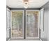 Sun room offers large windows with lots of natural light at 1508 Wingate Way, Atlanta, GA 30350