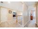 Upstairs hallway with carpeted floors, access to bedrooms, and neutral color scheme at 2285 Briarwood Trl, Cumming, GA 30041