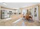 Bright kitchen featuring stainless steel appliances, granite countertops, and a dining area at 2285 Briarwood Trl, Cumming, GA 30041