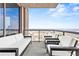 Balcony featuring comfortable seating and stunning panoramic city views from a high-rise building at 270 17Th Nw St # 4208, Atlanta, GA 30363