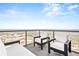 Outdoor seating area offering city views on a private balcony at 270 17Th Nw St # 4208, Atlanta, GA 30363