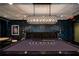 Upscale game room with pool table, poker table, and comfortable lounge seating with elegant design features at 270 17Th Nw St # 4208, Atlanta, GA 30363