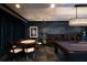 Upscale game room with poker table, pool table, and comfortable lounge seating with elegant design features at 270 17Th Nw St # 4208, Atlanta, GA 30363