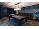 Upscale game room with pool table, poker table, and comfortable lounge seating with elegant design features at 270 17Th Nw St # 4208, Atlanta, GA 30363