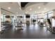 Well-equipped fitness center with various machines, weights, and large windows overlooking the city at 270 17Th Nw St # 4208, Atlanta, GA 30363
