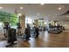 Well-equipped gym with modern elliptical machines, treadmills, and large windows at 270 17Th Nw St # 4208, Atlanta, GA 30363