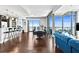 Bright living room with floor-to-ceiling windows and an open floor plan with modern finishes and balcony access at 270 17Th Nw St # 4208, Atlanta, GA 30363