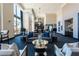 Beautifully appointed living room with floor to ceiling windows, comfortable seating, and modern decor at 270 17Th Nw St # 4208, Atlanta, GA 30363