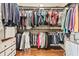 Spacious walk-in closet with custom shelving and drawers to maximize storage at 270 17Th Nw St # 4208, Atlanta, GA 30363