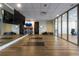 Bright yoga studio with hardwood floors, mirrored wall, exercise mats, and ample space for fitness activities at 270 17Th Nw St # 4208, Atlanta, GA 30363
