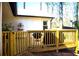 Wooden back deck provides space for grilling and outdoor entertaining within a wooded landscape at 3065 Wildflower Ln, Snellville, GA 30039