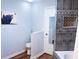 Charming bathroom features tile shower, decorative niche, and toilet in a clean and modern setting at 3065 Wildflower Ln, Snellville, GA 30039