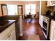 Modern kitchen with stainless steel appliances and dark countertops at 3065 Wildflower Ln, Snellville, GA 30039