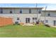Spacious backyard featuring a well maintained lawn, a wooden fence, and a patio at 695 Georgetown Ct, Jonesboro, GA 30236