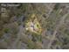 Overhead view of property showing neighborhood and surrounding trees at 2073 Lou Ct, Grayson, GA 30017