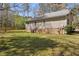A large backyard and grassy lawn, perfect for outdoor activities at 2073 Lou Ct, Grayson, GA 30017