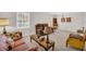 A delightful living area features carpeting, with a vintage style and plenty of space for your furniture at 2073 Lou Ct, Grayson, GA 30017